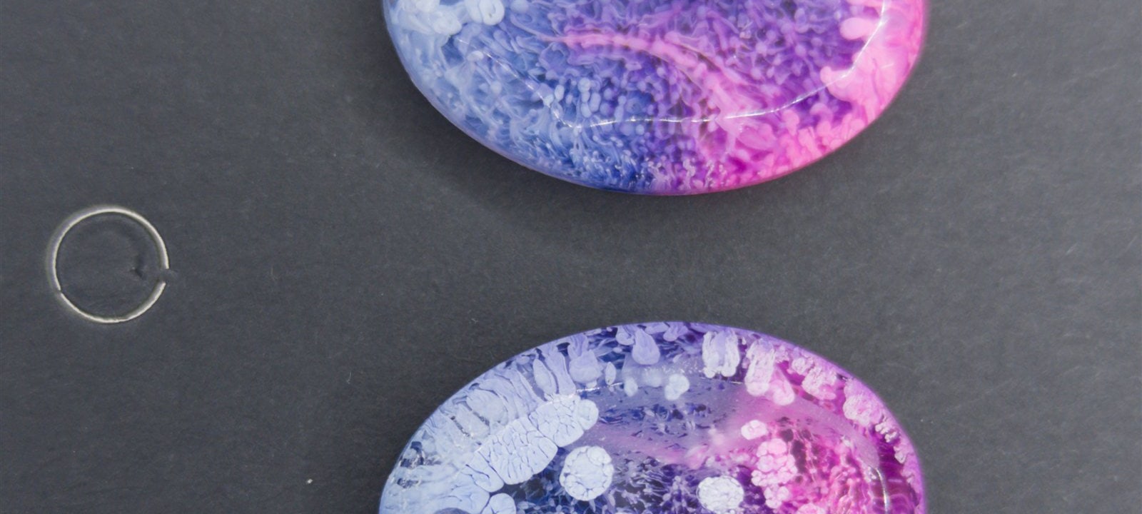 Hand-poured resin pendant from the Kaidora Art studio